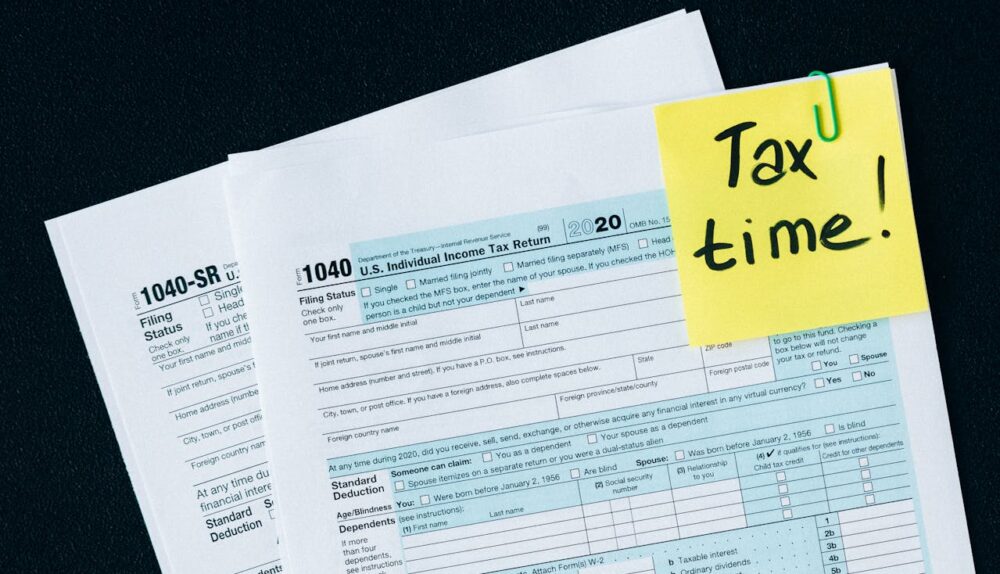 Tax documents on a black surface