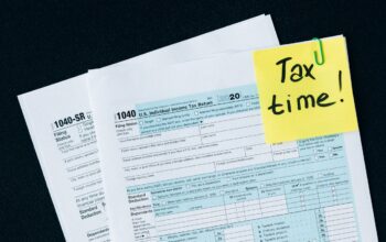 Tax documents on a black surface